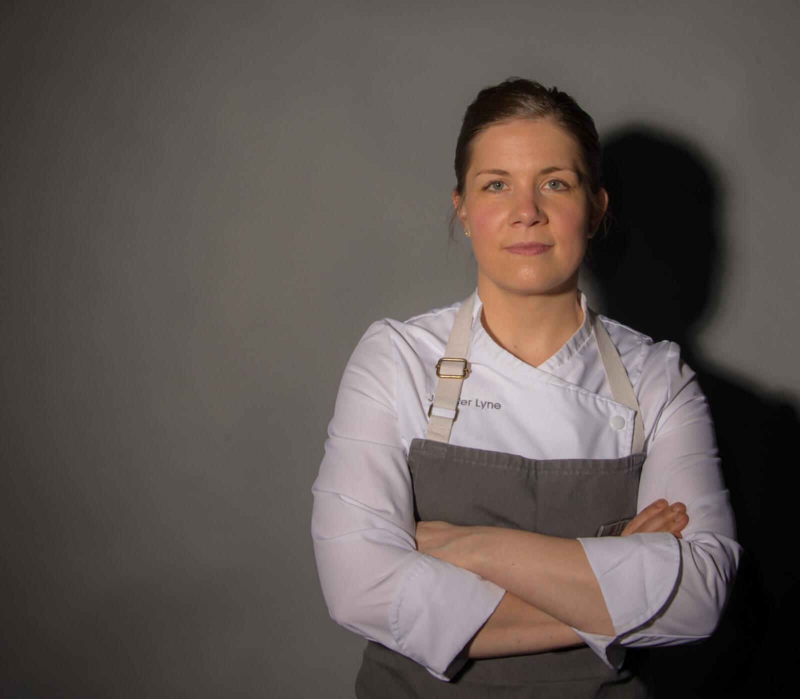 Photo of Jennifer Lyne in apron