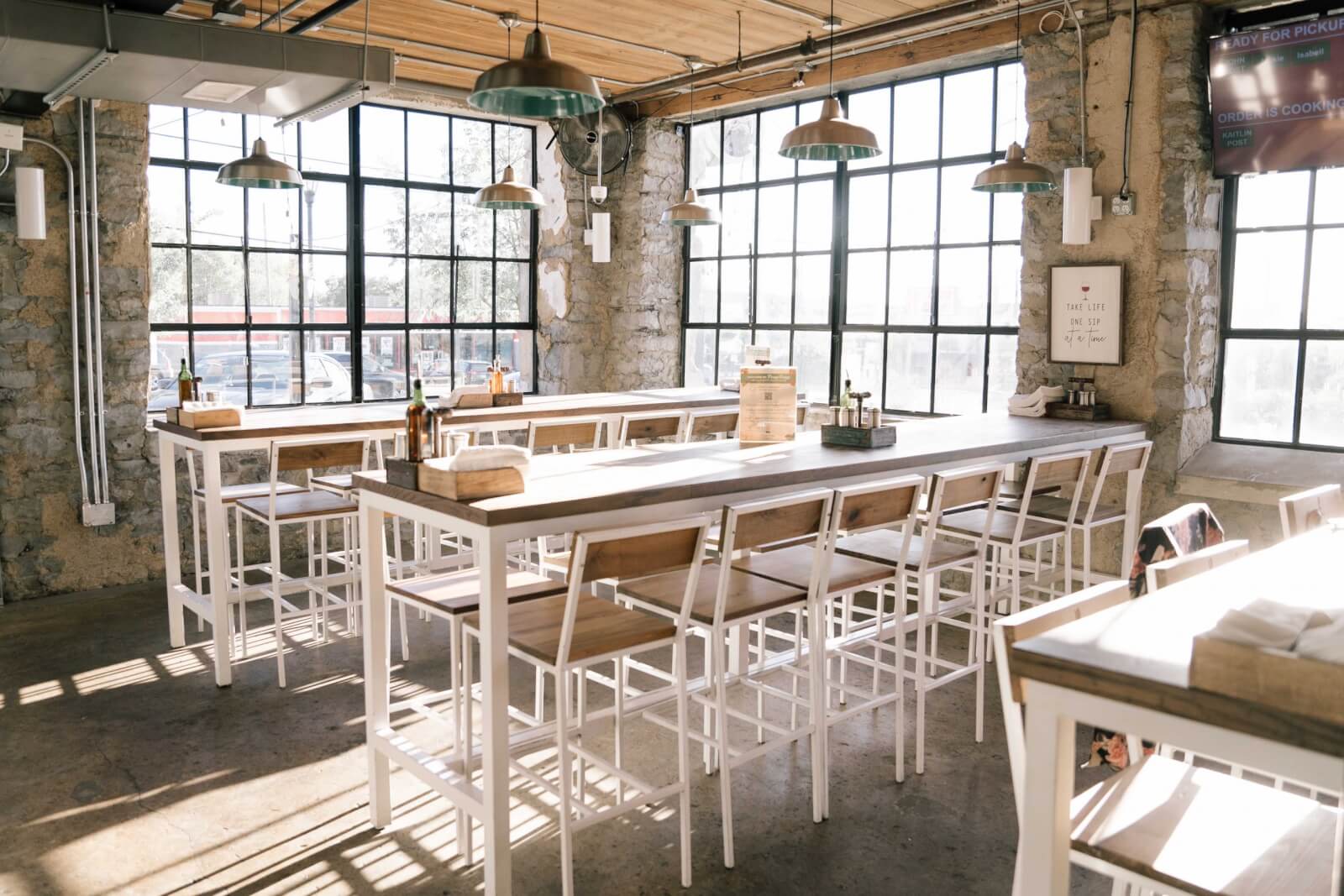 Dining area with communal tables at PennePazze.
