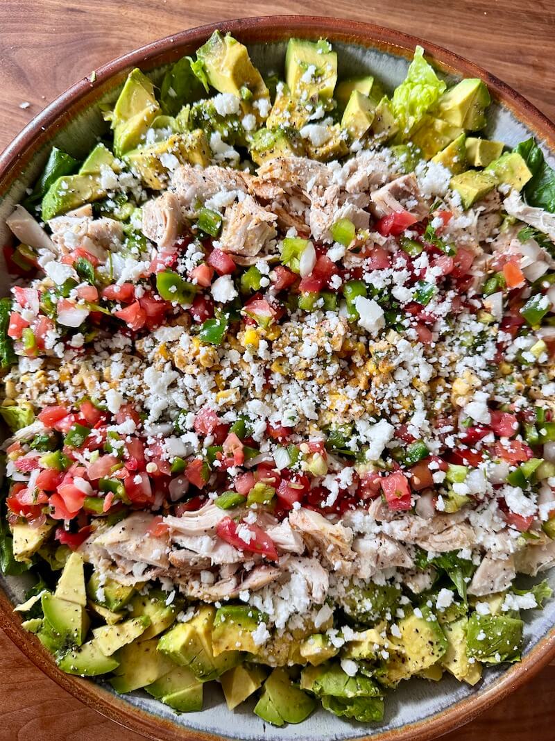 Mexican salad with avocado, corn, pico, chicken