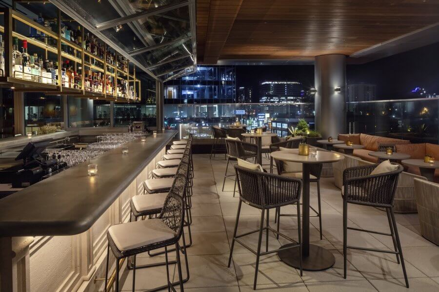 Thistle and Rye's outdoor dining space overlooking downtown Nashville