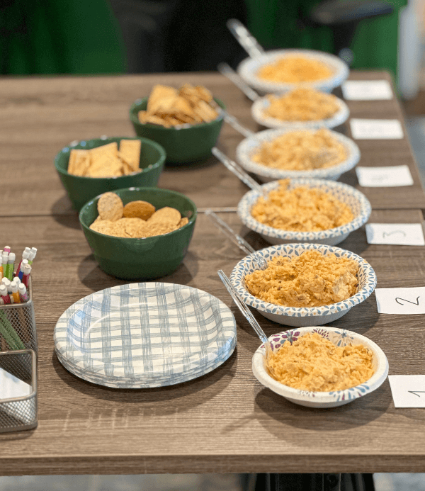 spicy pimento cheese samples lined up on table