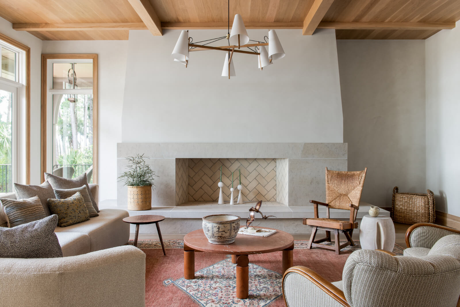 Living room with fireplace and wood ceiling from Cortney Bishop