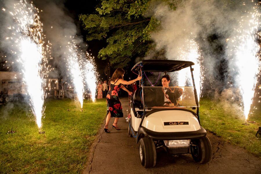 A Wild Storybook Wedding You Won't Believe - 26 TJ and Kimberlin wedding send off in golf cart with sparklers