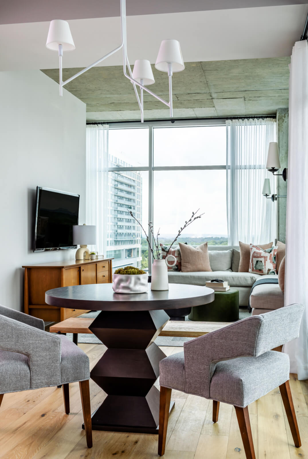 Breakfast table and chairs by condo living room