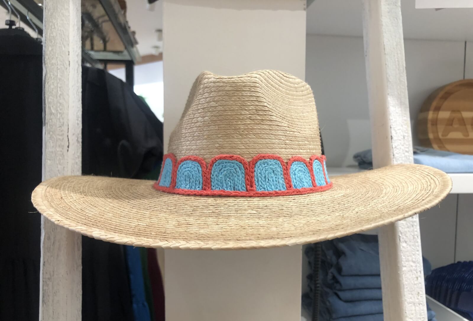 Straw hat with orange and blue detailing