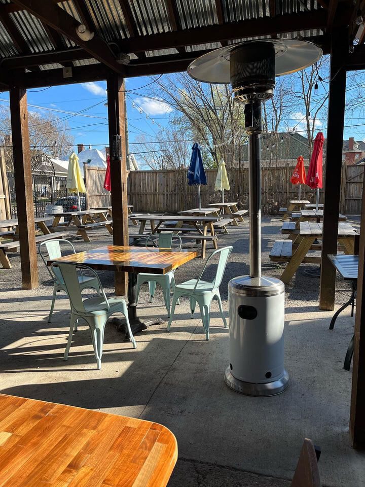 Patio area with tables at a Nashville wine bar.
