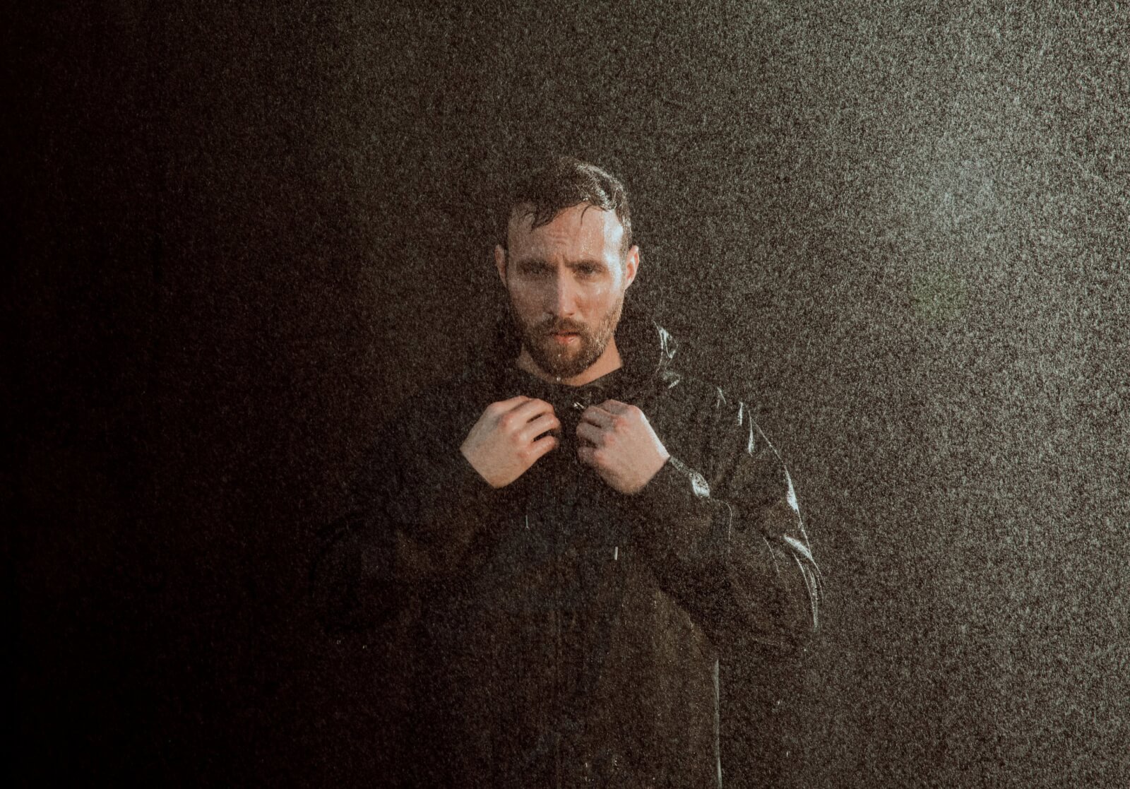 Ruston Kelly standing in the rain
