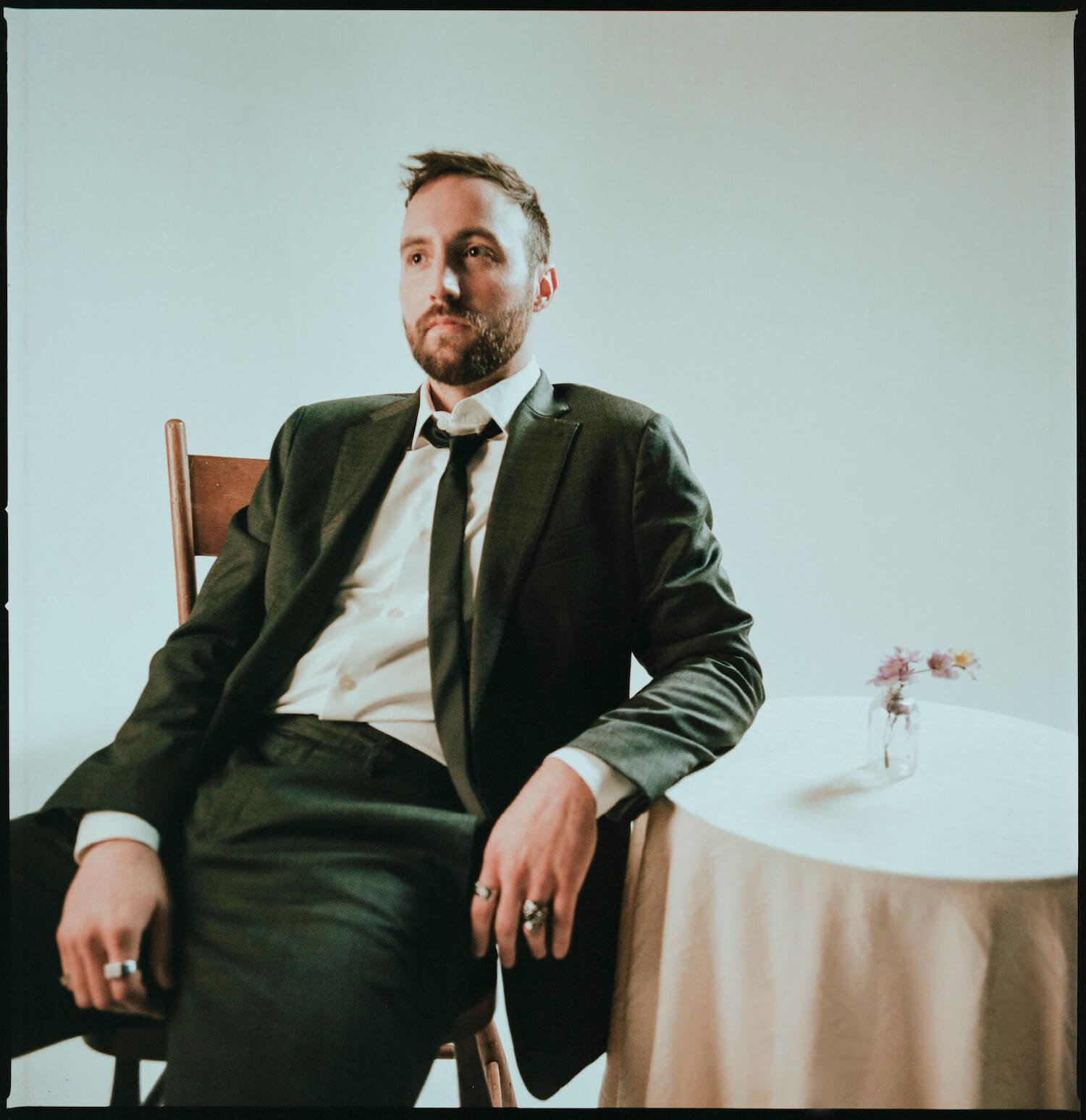 Ruston Kelly sitting at a table