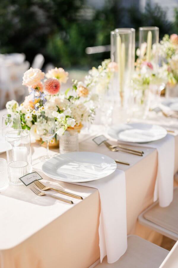 Flowers on a set wedding guest table