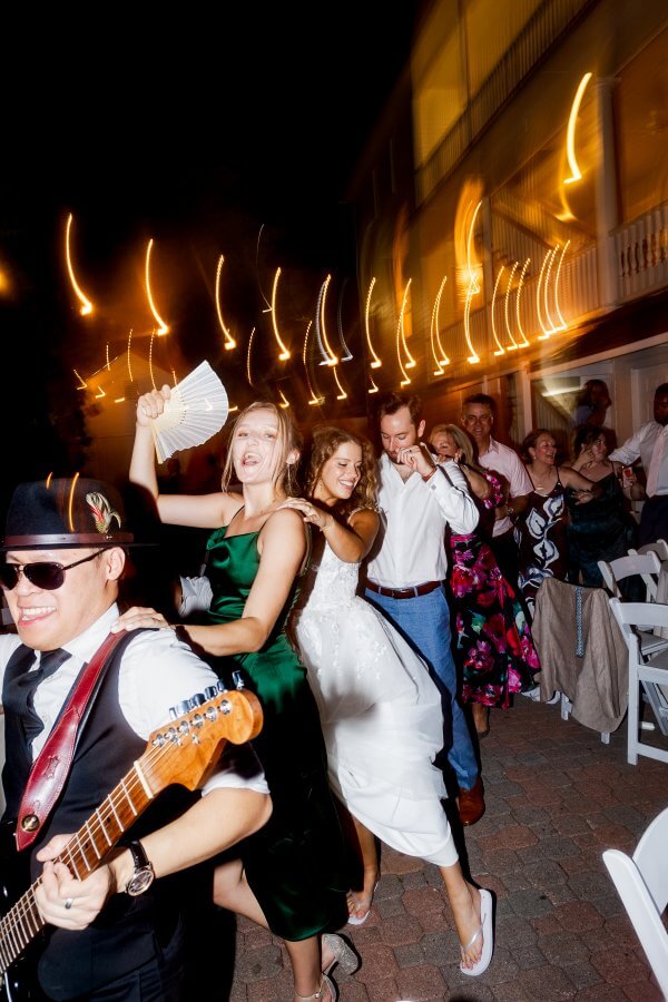 Band dancing with wedding guests