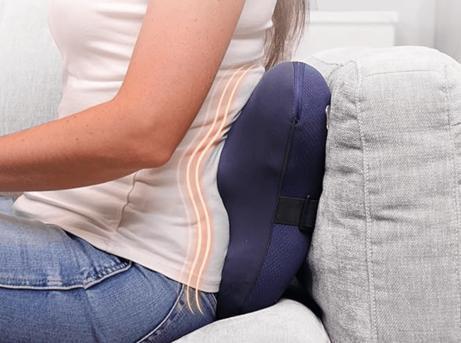 Person using portable back massager