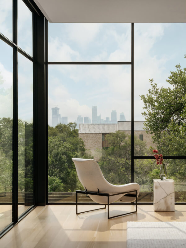 Floor-to-ceiling windows with view of Austin