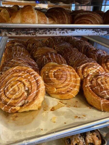 Baker's tray of sweet rolls and pastries