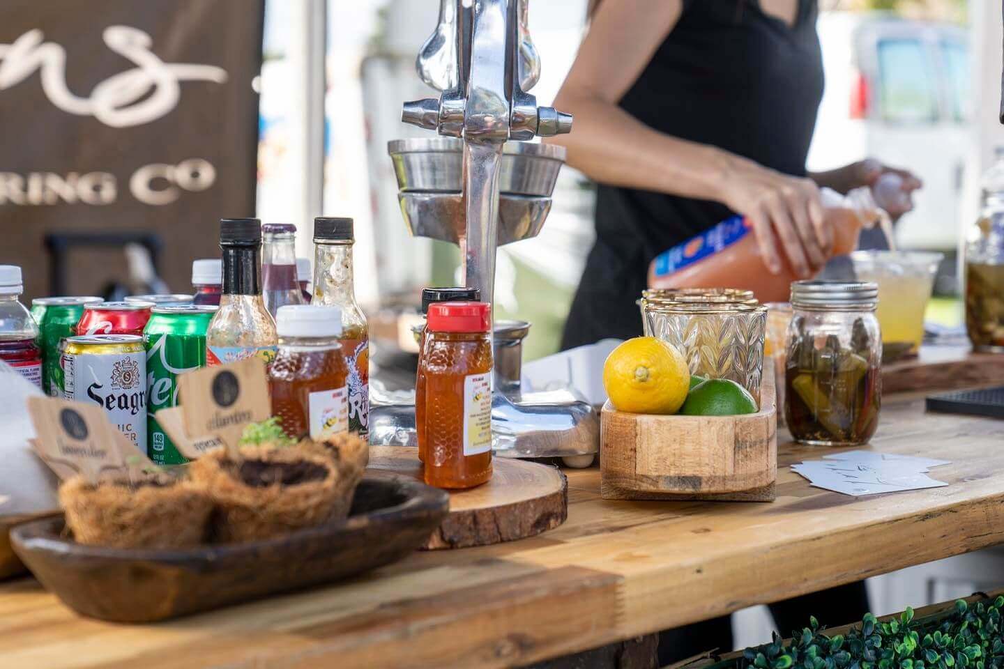 Bloody Mary ingredients lined up on bar