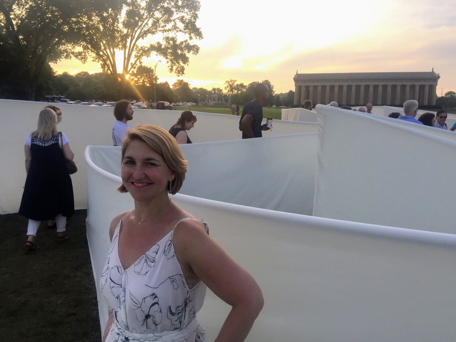 Woman on walkway in front of Parthenon