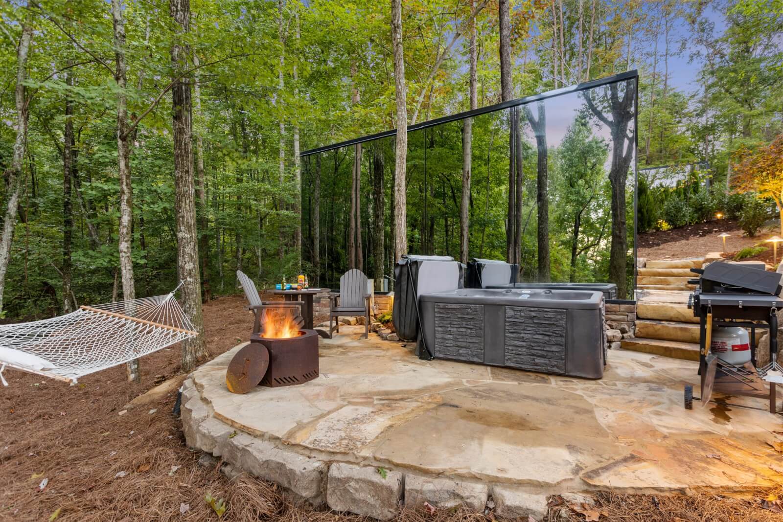 Mirror cabin with private patio area.