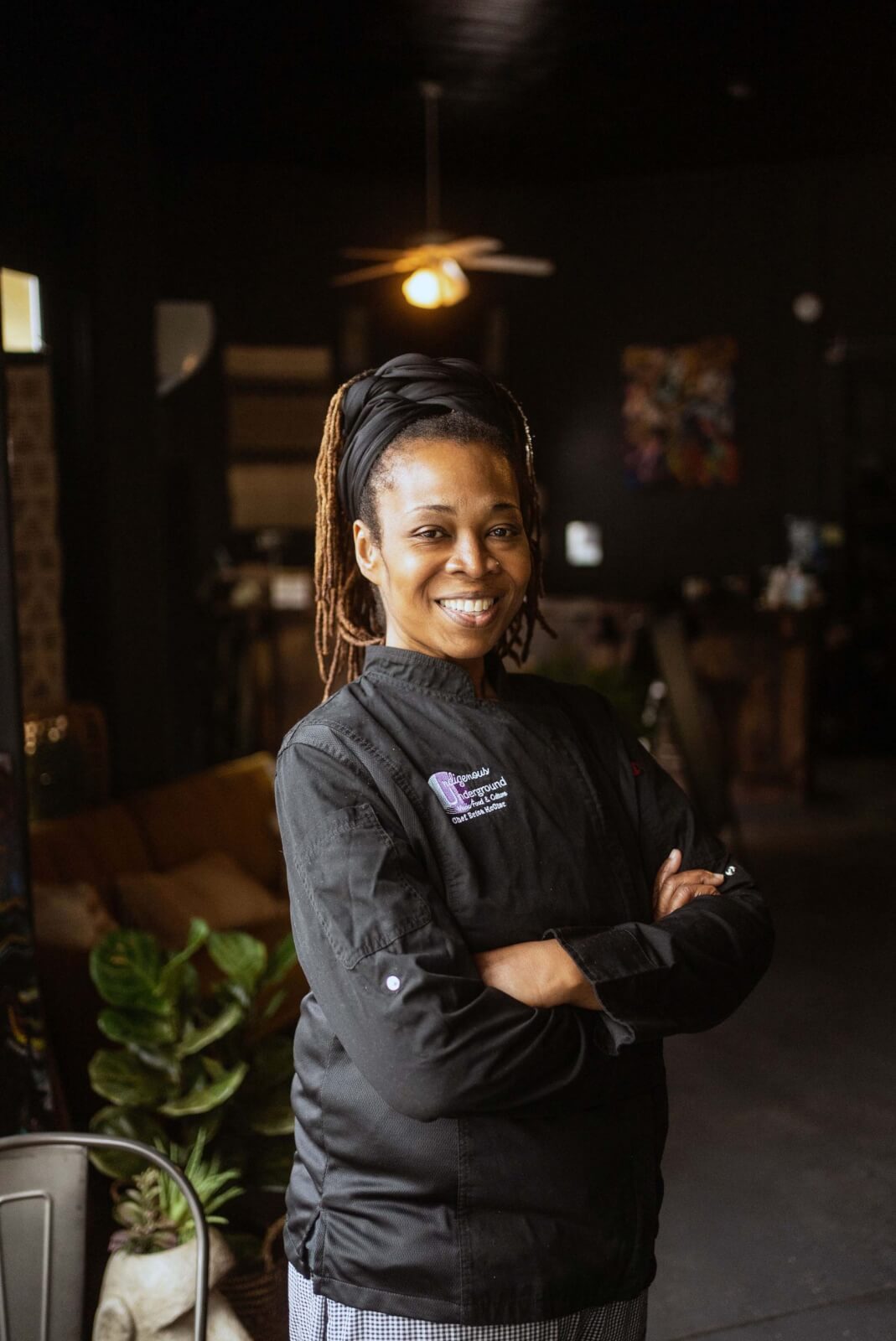 black female chef posing in uniform