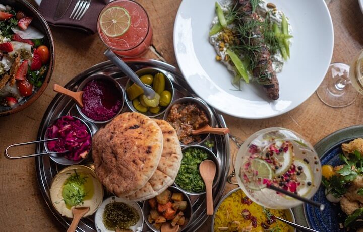 various Mediterranean dishes on a table