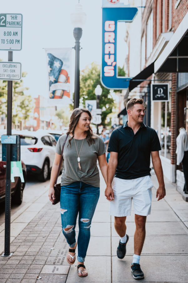 Man and woman strolling through Downtown Franklin