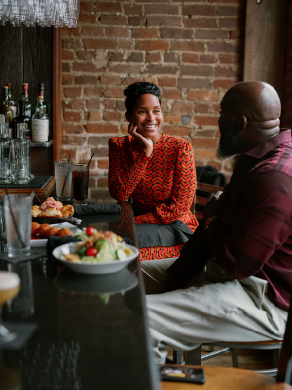 Man and woman dining at the GRAY'S on Main bar