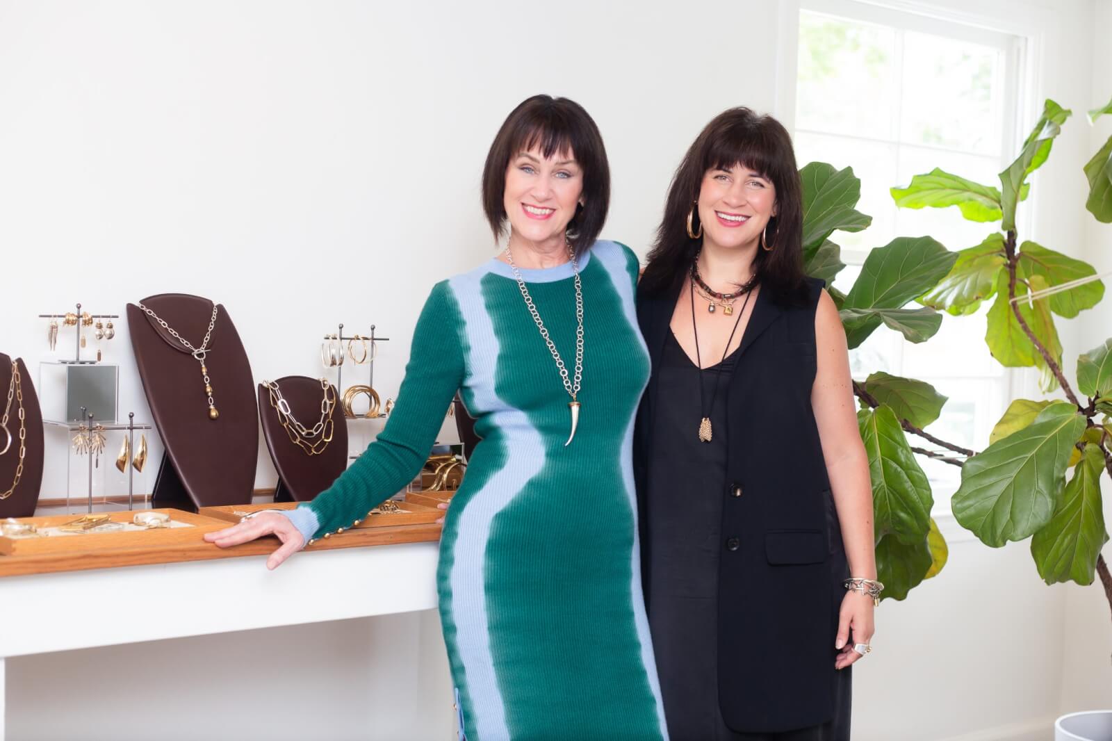 Meet Margaret Ellis's Mother-Daughter Tastemakers: Mclaine Richardson and Connie Cathcart-Richardson - 1 Mother and daughter smiling in front of jewelry