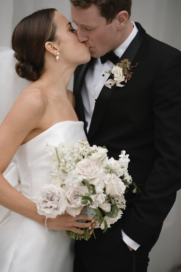 Bride and groom kissing