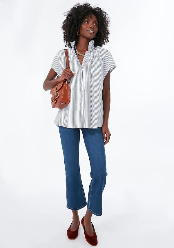model in striped blouse and jeans