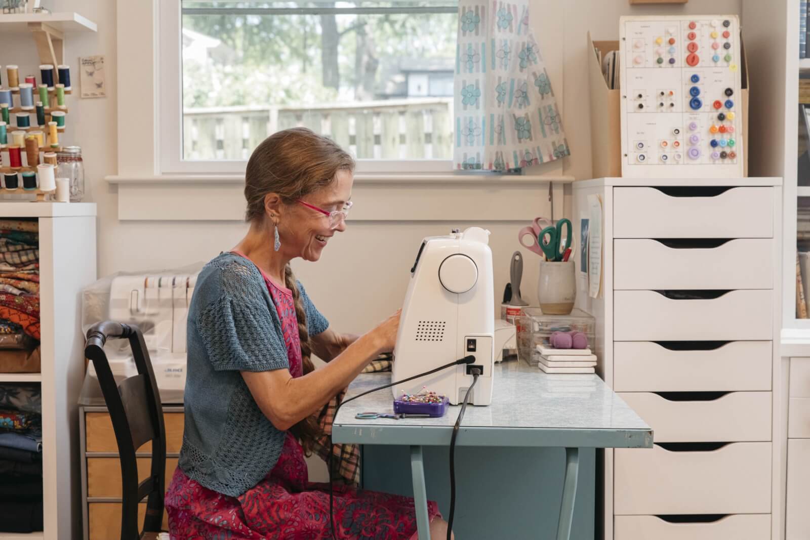 Woman using a sewing machine