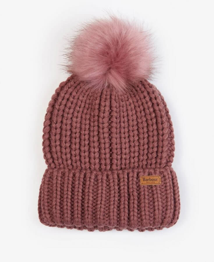 Dusty rose colored knit beanie with pom pom