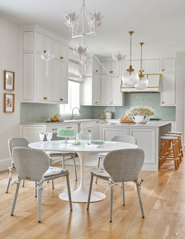 Kitchen with breakfast table and modern lighting