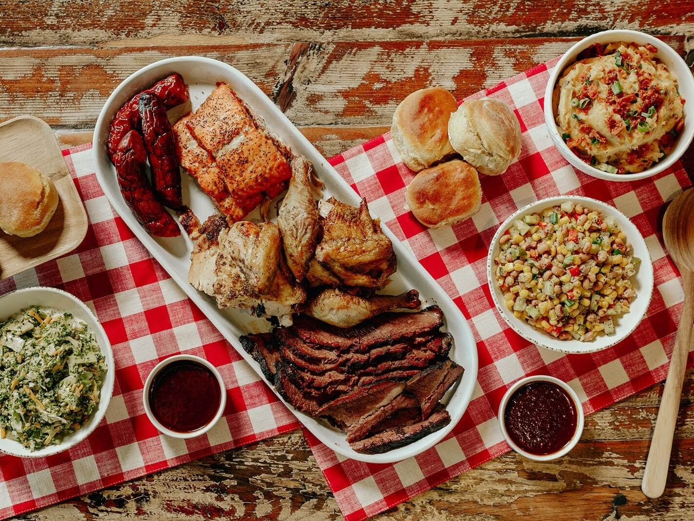 plate of brisket, chicken, salmon and sides from Wolf River Brisket