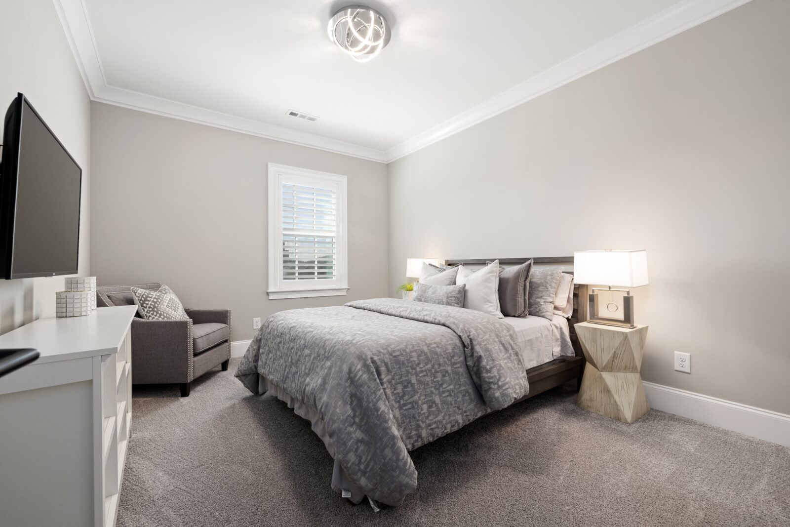 bedroom with TV and sitting area