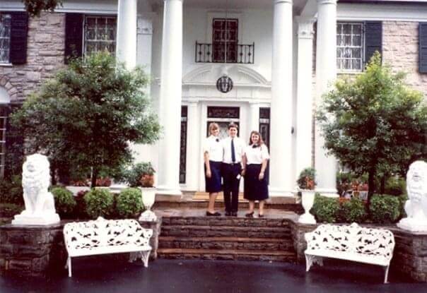 Angie Marchese and two other high schools pose outside of Graceland as tour guides 