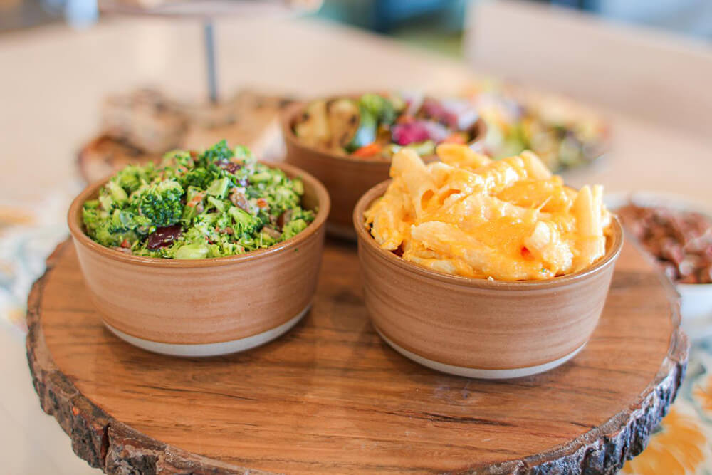 three bowls of side dishes