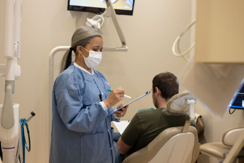 dental hygienist giving care