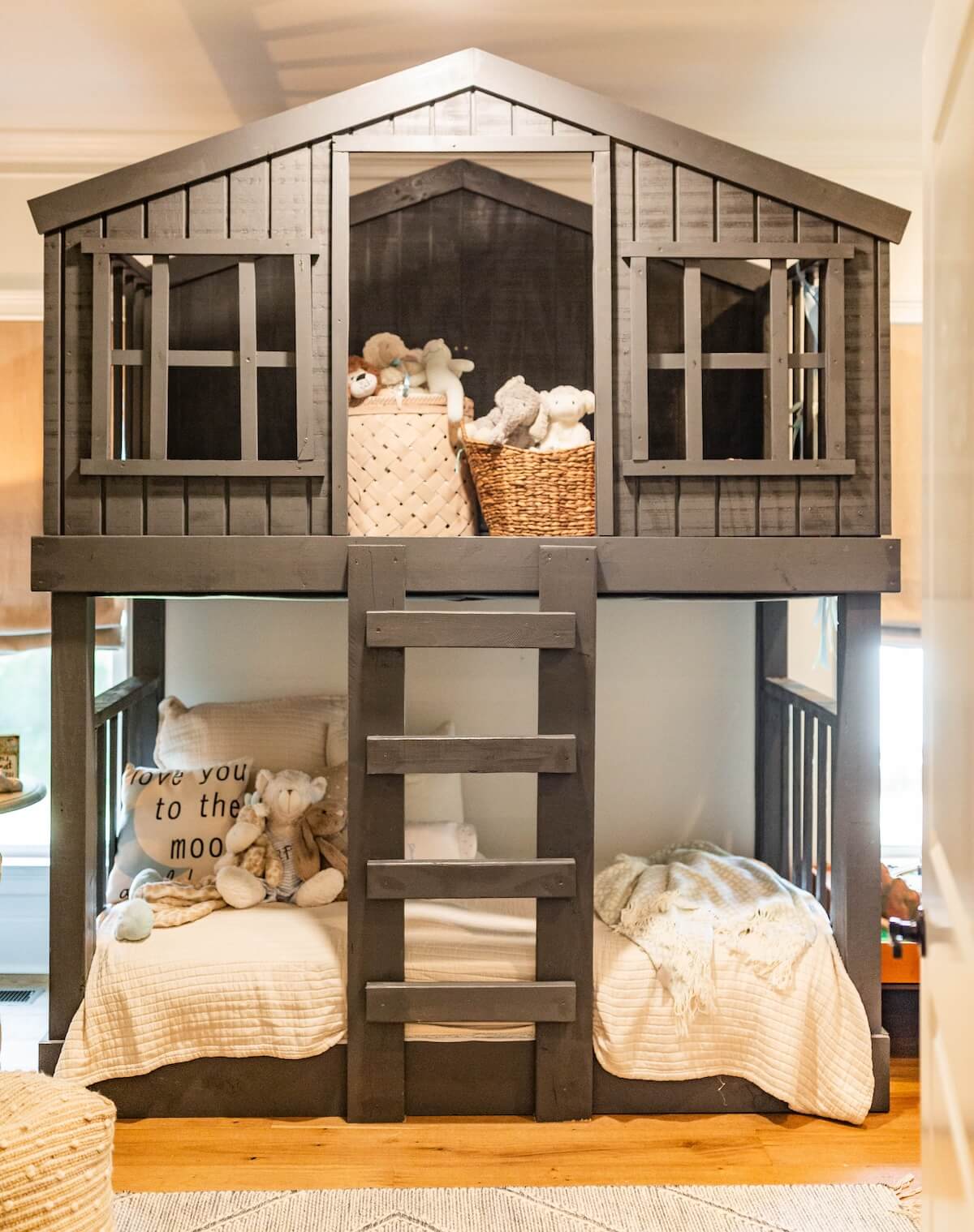 Bunk beds resembling a treehouse