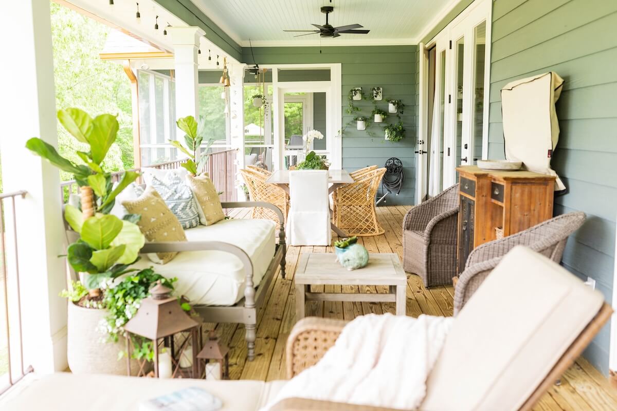 Four-season porch with furniture and dining table