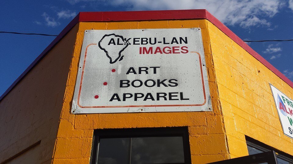 Front exterior sign outside of Alkebu-Lan Images & Bookstore