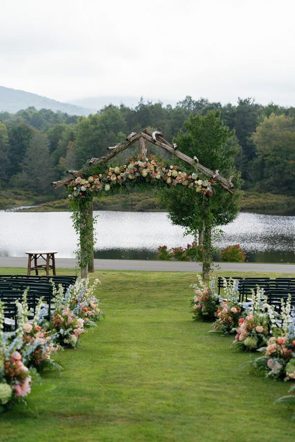 A North Carolina Wedding Dressed in Blues, Bows, and Bojangles - 2 A Linville wedding ceremony set up by a lake.