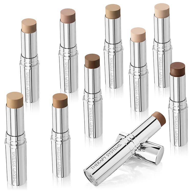 A collection of stick foundations in various shades displayed against a white background.