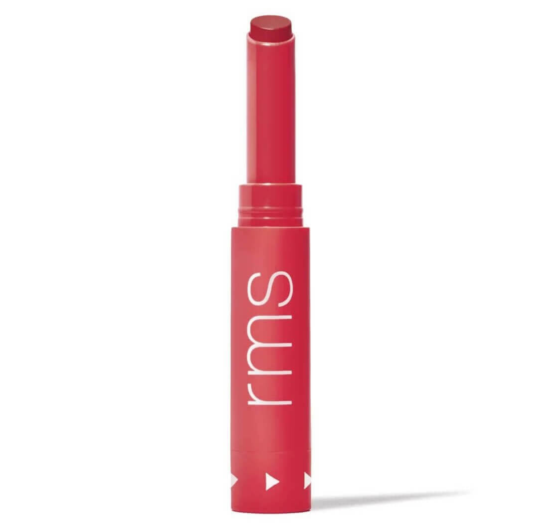 Red lipstick with an open cap on a white background.