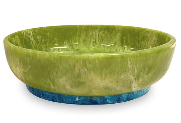 A green marbled bowl with a glossy finish. The base features a striking blue marbled pattern, making it a standout piece.