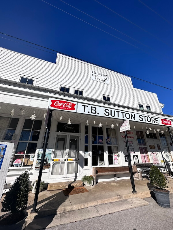 Historic t.b. sutton general store facade on a sunny day at Wildwood Resort.