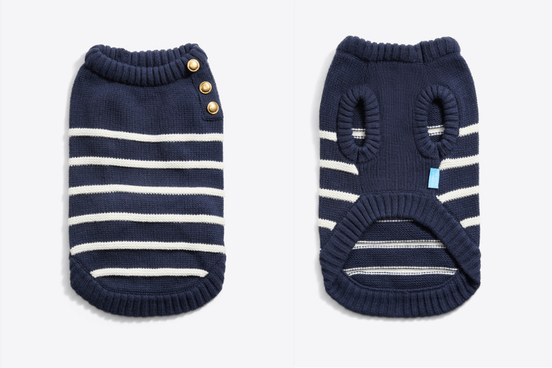 Navy-blue and white striped dog sweater shown from the back and front. Features include a ribbed collar, three buttons on the neckline, and openings for the dog's legs and underside.