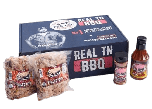 A box labeled "Real TN BBQ" is accompanied by two packs of pulled pork, a bottle of barbecue sauce, and a spice shaker—your ultimate Nashville barbecue experience.