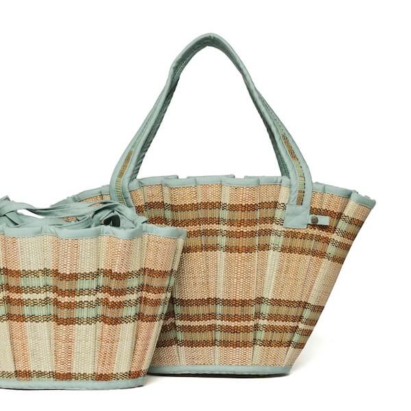 Two woven tote bags with light blue handles and plaid patterns in shades of brown, beige, and white—stylish FINDS displayed against a white background.