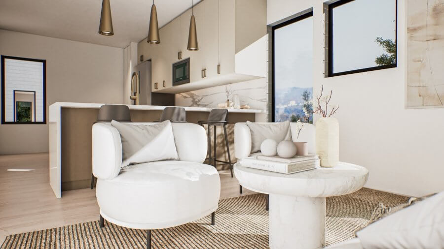 Modern living room with white armchairs, a round marble coffee table, striped rug, and an open kitchen with bar stools in the background. Natural light fills this stylish Nashville space at 1043 E Trinity Ln, Nashville TN.