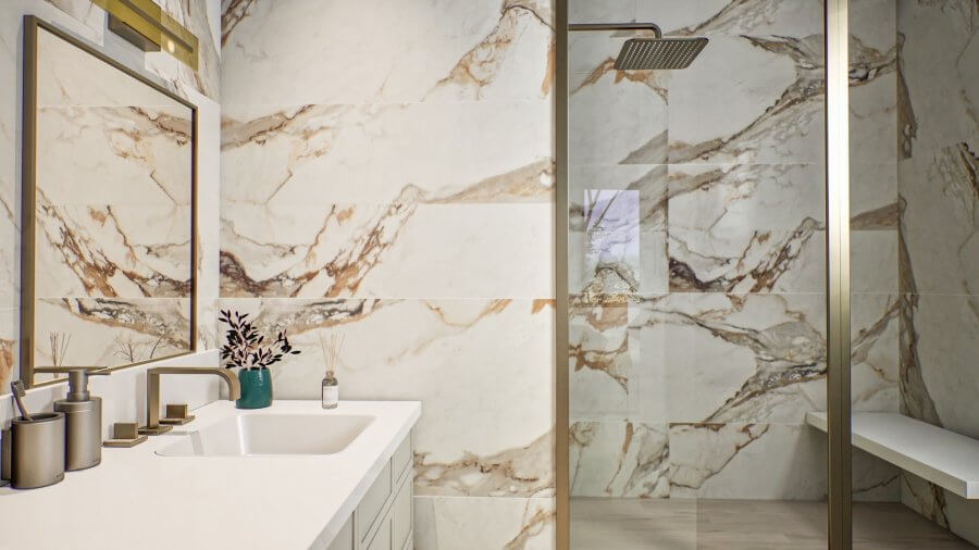 Modern bathroom at 1043 E Trinity Ln, Nashville, with marble-patterned walls, glass shower enclosure, white countertop with sink, toiletries, a vase, and a large mirror.