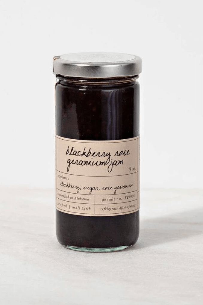 A FINDS glass jar with a metal lid containing blackberry rose geranium jam, labeled with ingredients and storage instructions, discovered in Birmingham this May.