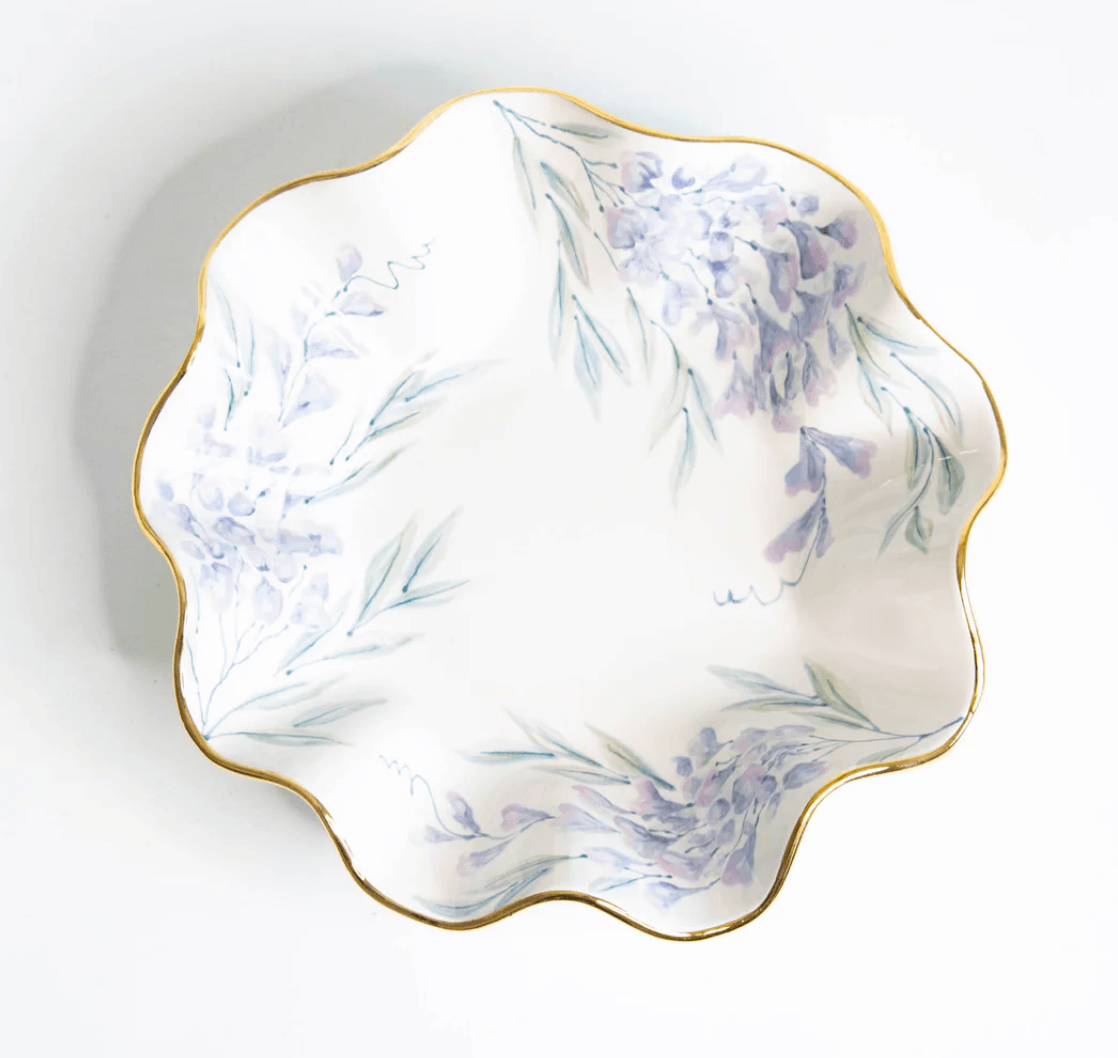 May FINDS: Scalloped porcelain dish with gold rim, decorated with light purple floral patterns and green leaves on a white background—an elegant Birmingham collectible.